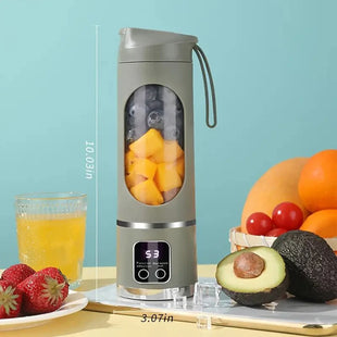 Mini USB Rechargeable Juicer Blender displayed on a kitchen countertop with fresh fruits, highlighting its compact design and suitability for smoothie making